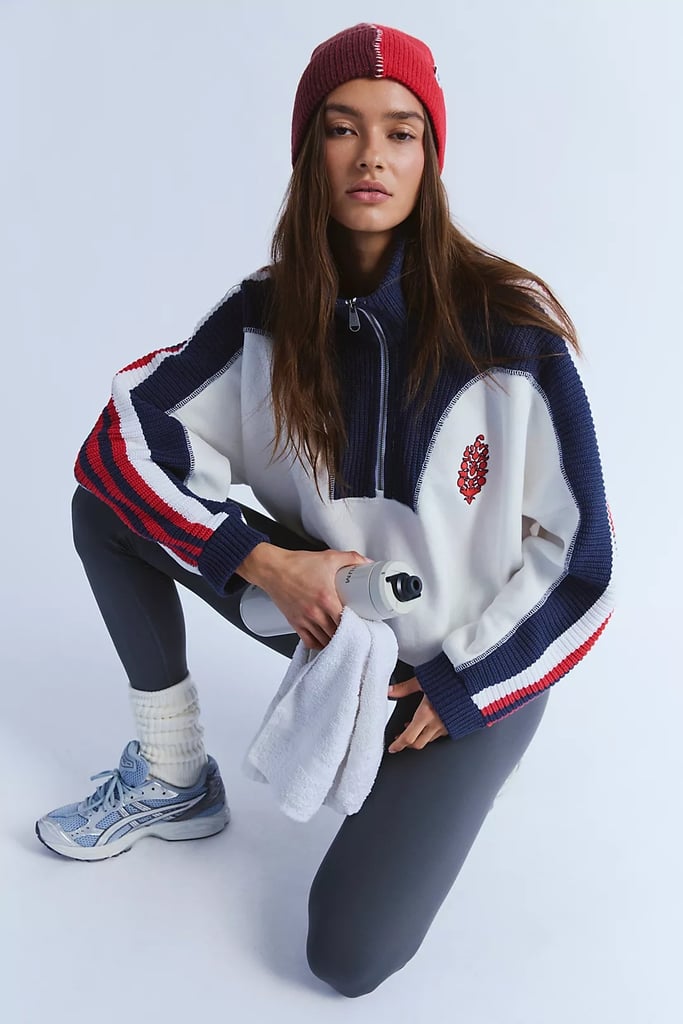 Free People Step It Up Half Zip ($198)
The high neck on this half-zip is everything, and the colors subtly hint Patriots without saying it. You can wear this beyond the Super Bowl. It's great for running errands, walks around the neighborhood, and more.