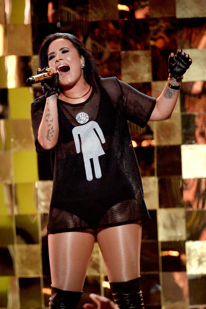Demi Lovato Wearing Gender Neutral Bathroom Shirt on Stage