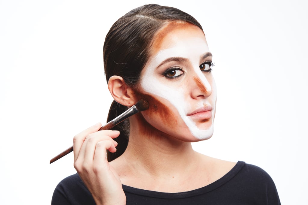 Place a dark brown greasebased color over the forehead, on the jaw