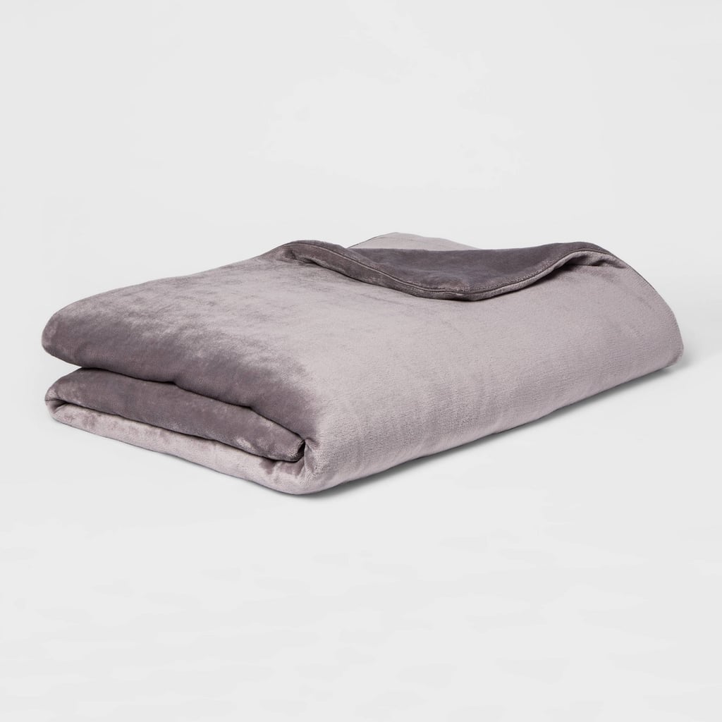 Something Comforting: Threshold 55" x 80" Microplush Weighted Blanket