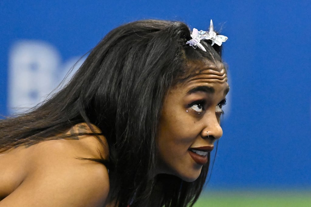 Wearing butterfly clips, under-eye rhinestones, and maroon lipstick at the 2021 ISTAF competition in Berlin.