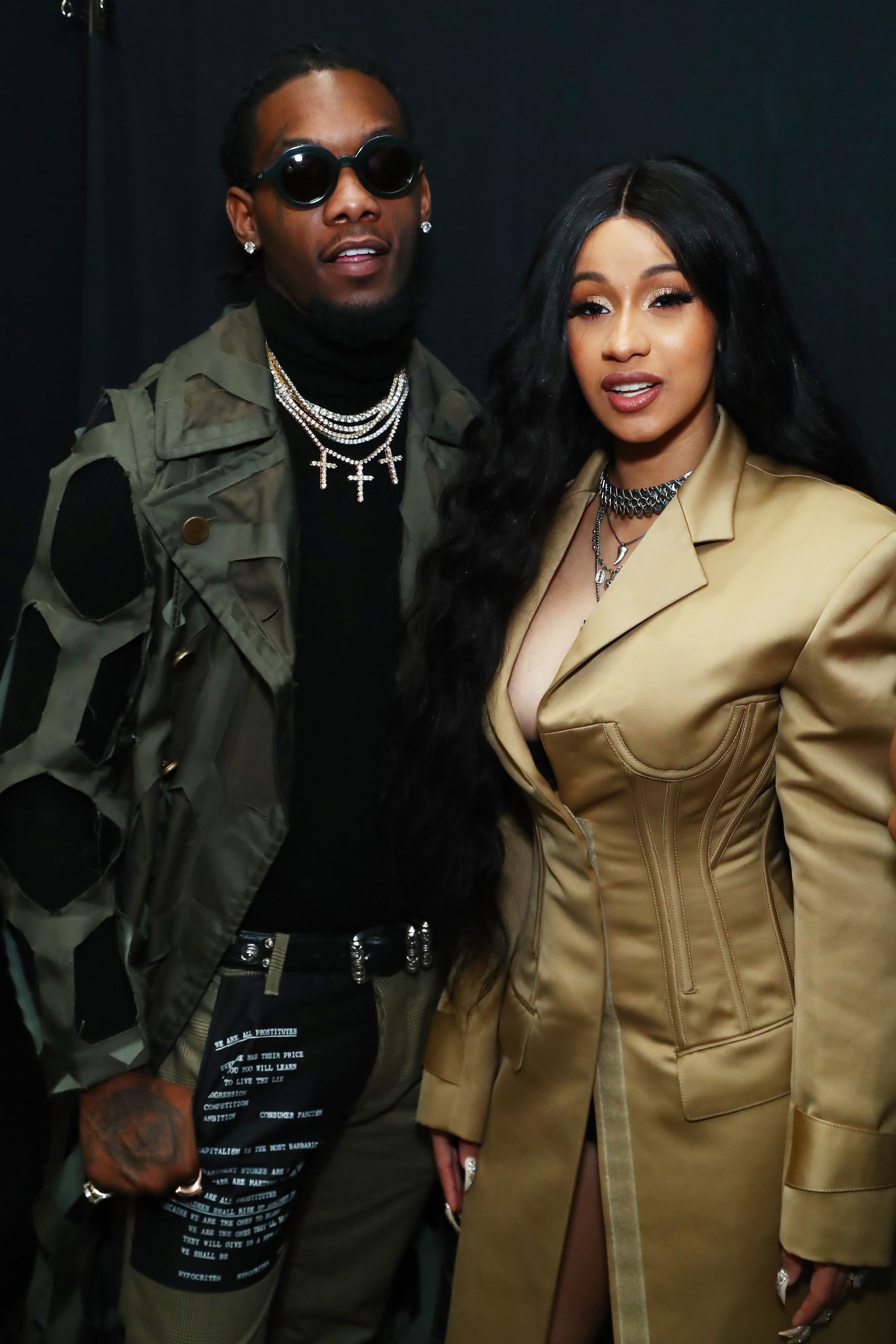 NEW YORK, NY - FEBRUARY 11:  Recording artists Offset of the group Migos and Cardi B pose backstage for Prabal Gurung during New York Fashion Week: The Shows at Gallery I at Spring Studios on February 11, 2018 in New York City.  (Photo by Astrid Stawiarz/Getty Images for New York Fashion Week: The Shows)