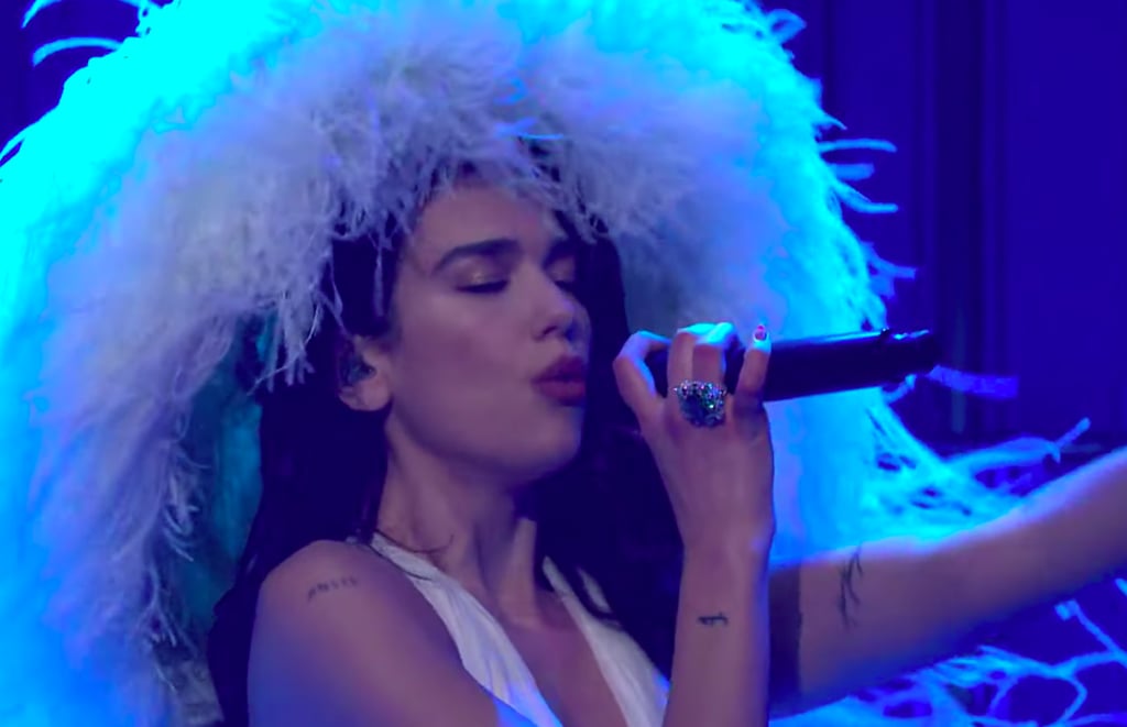 Dua Lipa Wore a Giant Feathered Hat While Performing on SNL