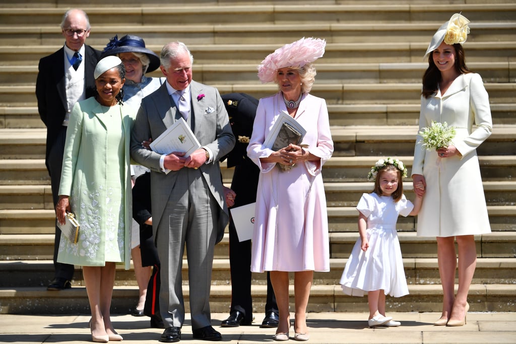 On Meghan's wedding day, Doria stood outside the chapel with her new relatives Prince Charles, Camilla Parker Bowles, Kate Middleton, and Princess Charlotte.