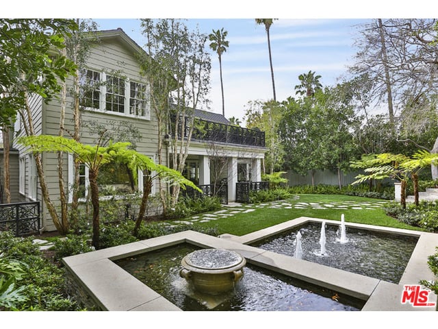The roomy home nestled at the foothills of Runyon Canyon is super-private, with a lush front yard featuring a reflecting fountain and a covered front porch. The first floor of the home even has a "gentleman's room," the rumored site of Charlie Chaplin's first wedding. (Do you think it was a silent wedding?)