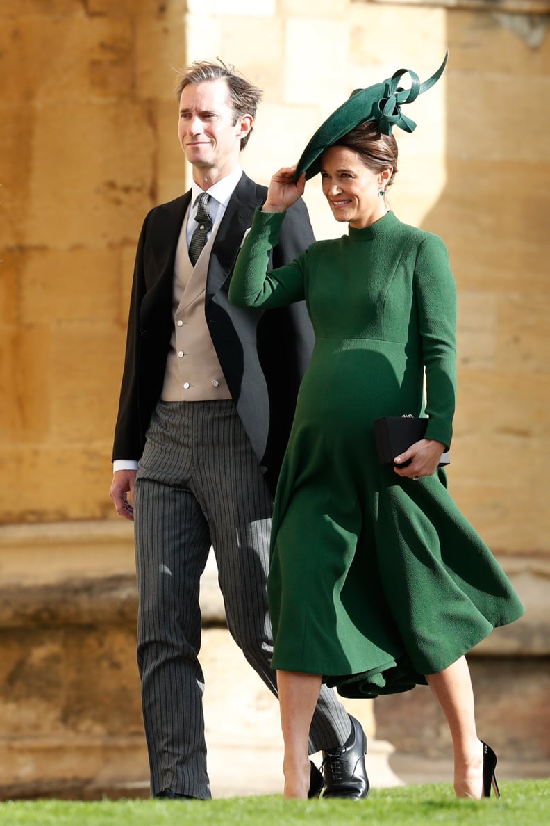 Matching Her Hat With an Emerald Green Dress