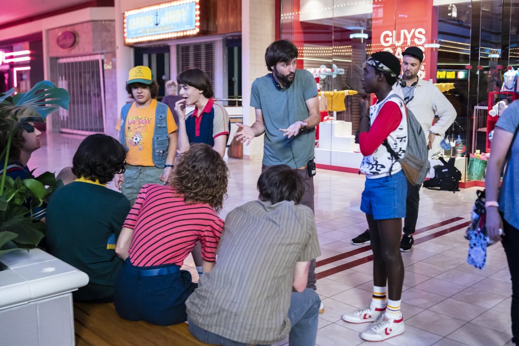 Cocreator Ross Duffer hangs with the young cast during one of the season's scenes at the Starcourt Mall.