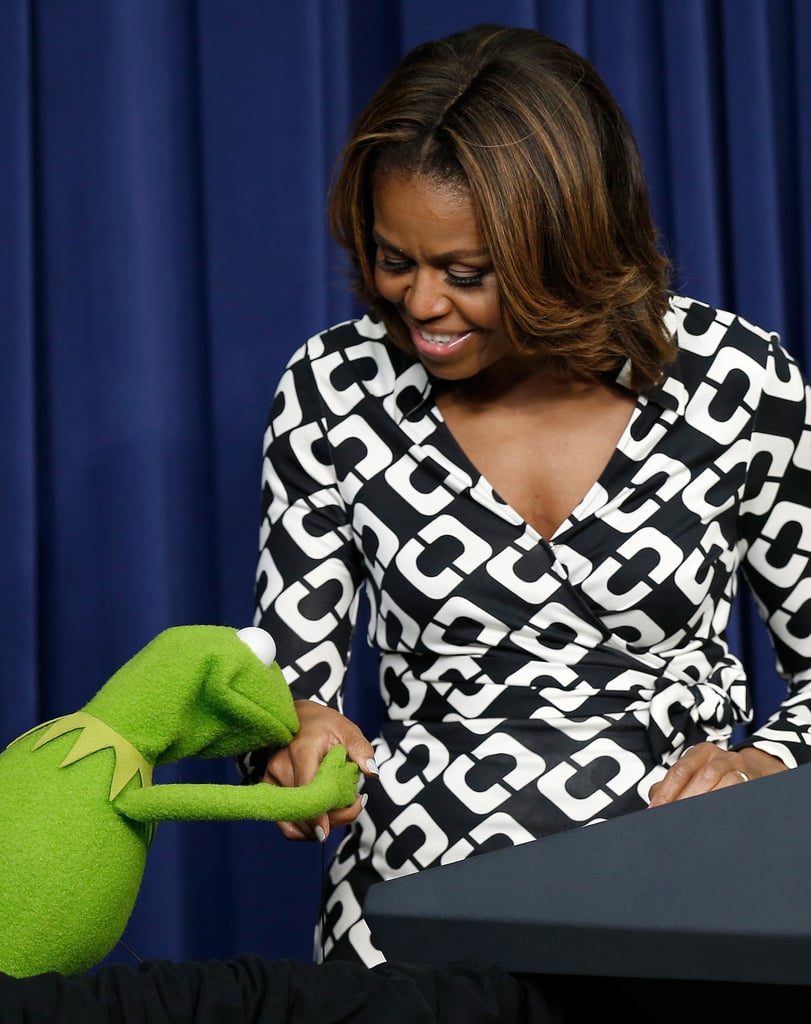 He gave the first lady a little kiss.