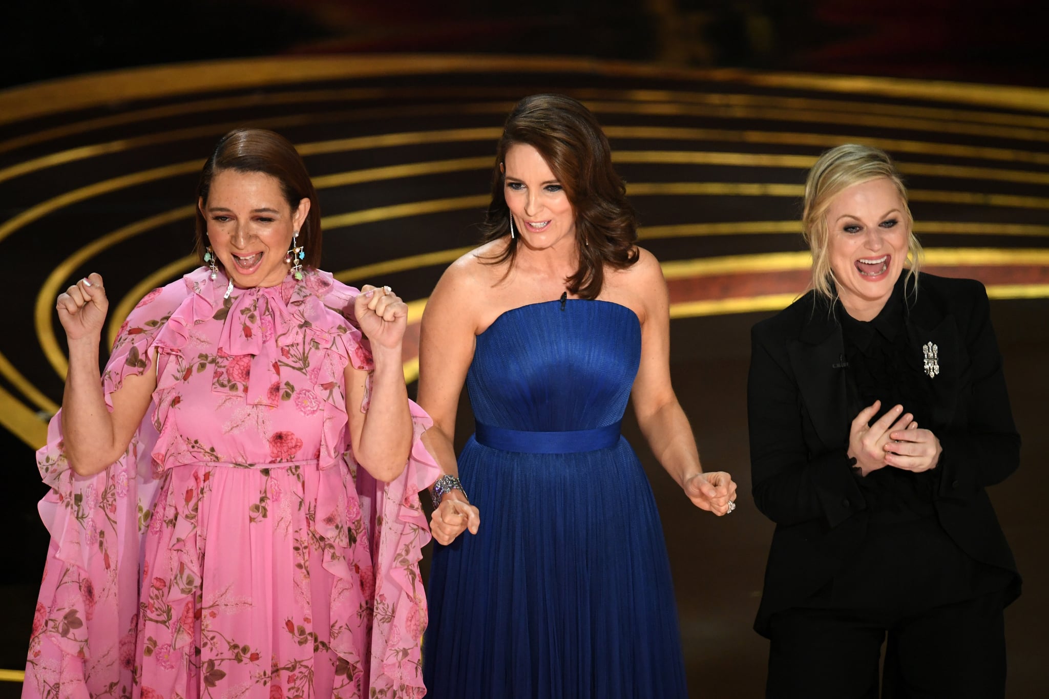 HOLLYWOOD, CALIFORNIA - FEBRUARY 24: (L-R) Maya Rudolph, Tina Fey, and Amy Poehler speak onstage during the 91st Annual Academy Awards at Dolby Theatre on February 24, 2019 in Hollywood, California. (Photo by Kevin Winter/Getty Images)