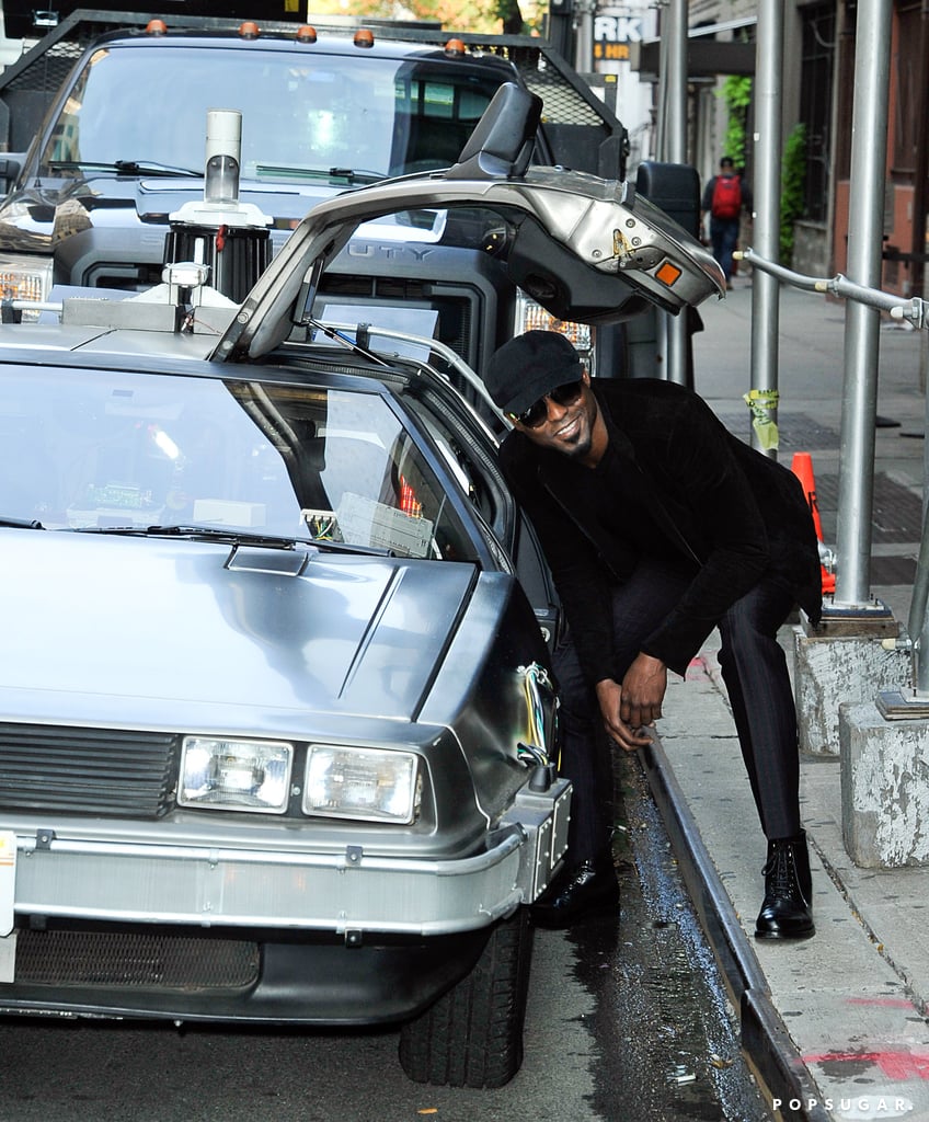 Wayne Brady looked thrilled to be next to a classic DeLorean in NYC on Wednesday.