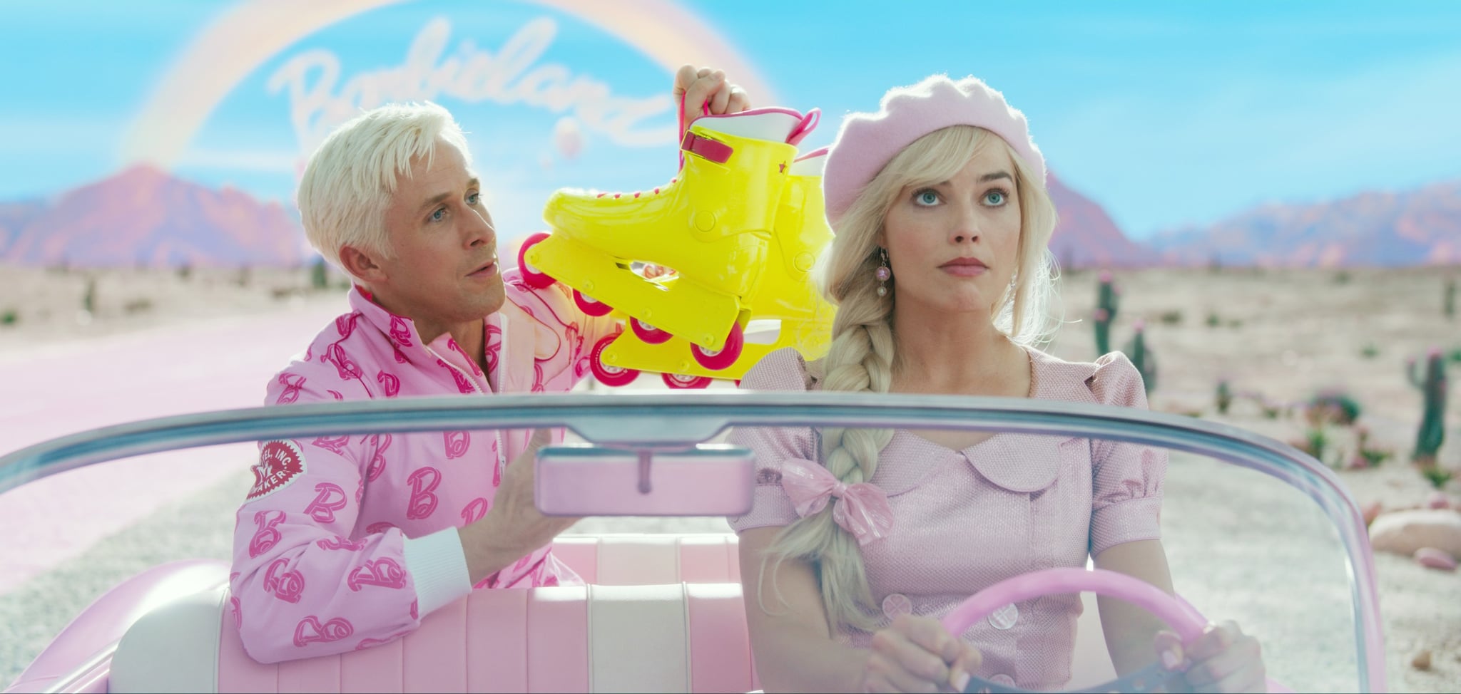  Ryan Gosling as Ken, Margot Robbie as Barbie, 2023.  Warner Bros. / Courtesy Everett Collection
