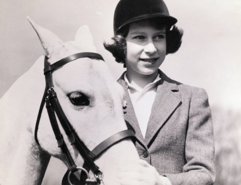 Crown Princess Elizabeth of Great Britain, later Queen Elizabeth II, with her pony, at age 10.