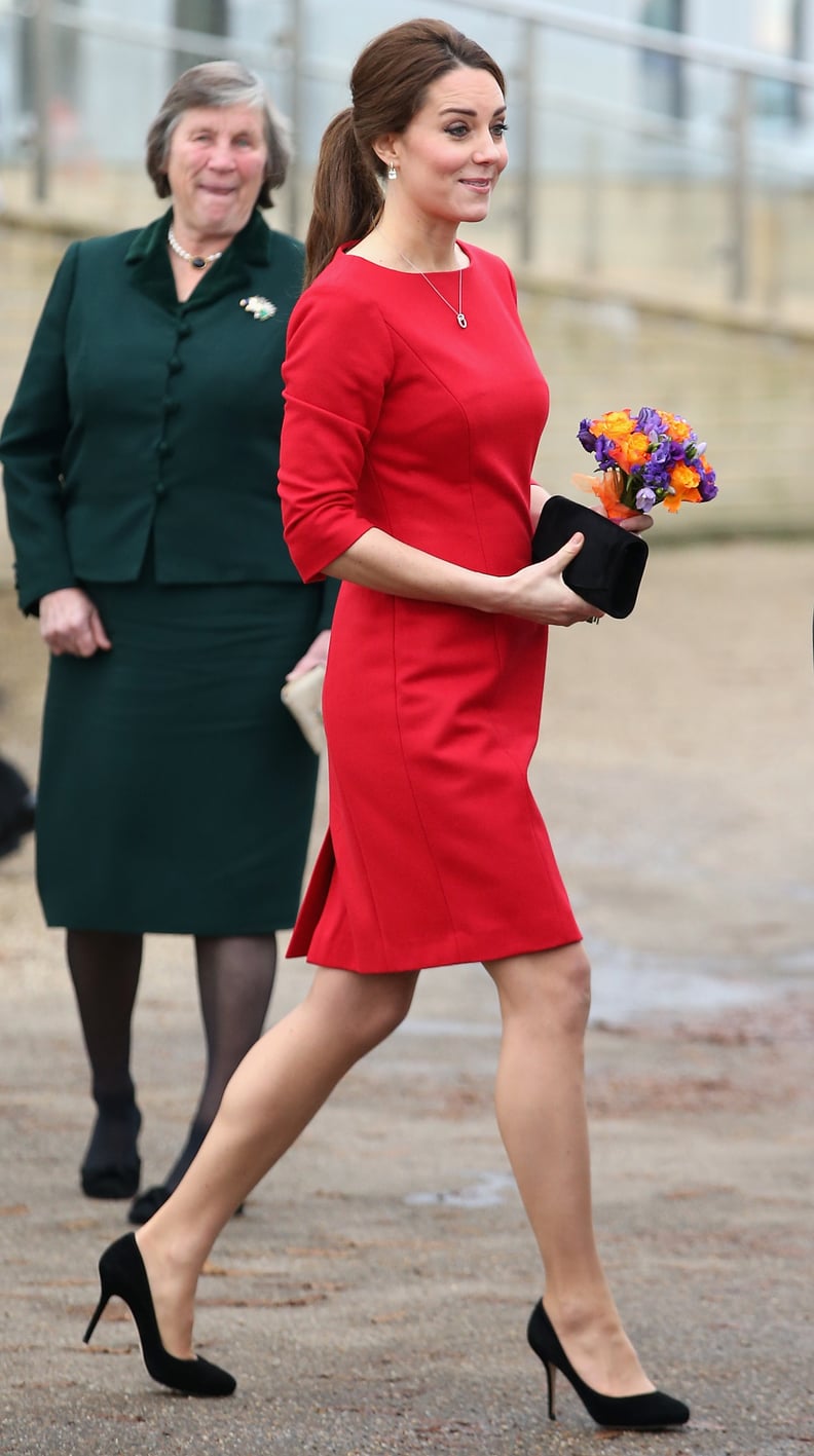 While Some Girls Carry Either Flowers or a Clutch, Kate Can Carry Both