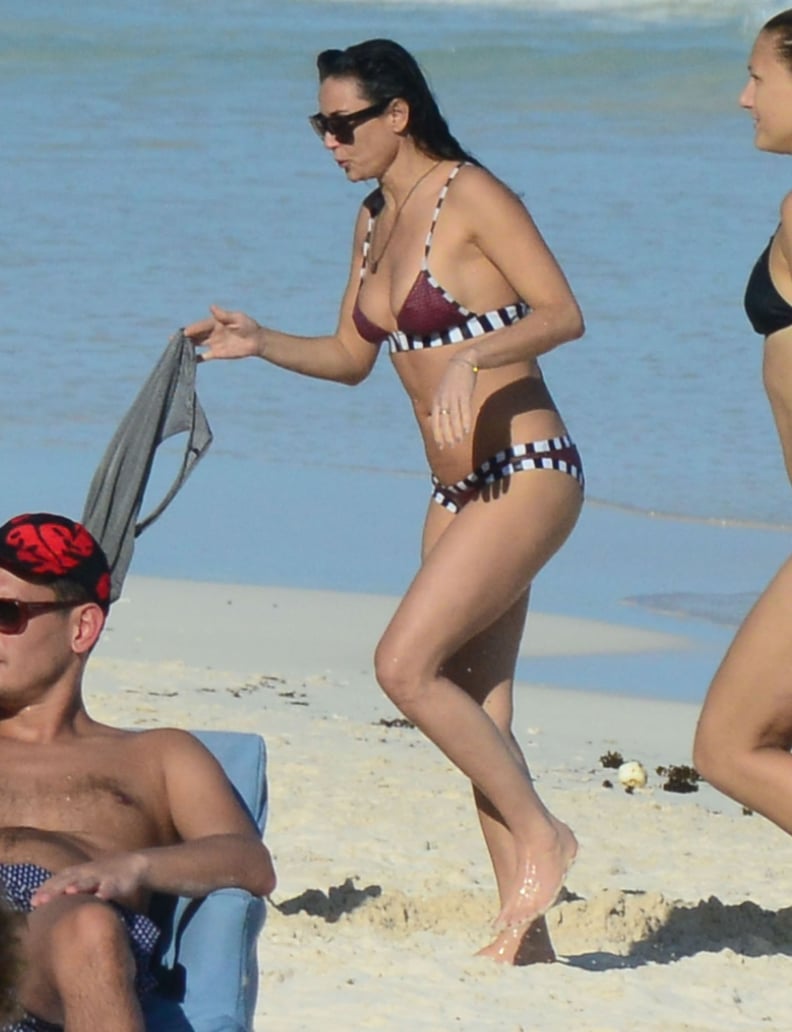Demi showed off a striped bikini.