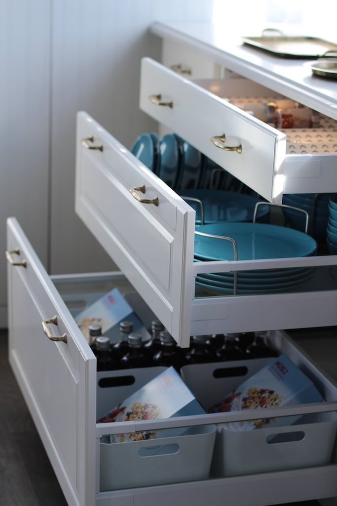 Ikea's new Sektion cabinet organizers help to squeeze out as much utility as possible. These plate organizers make it easy to keep extra plates in drawers if you run out of cabinet space.