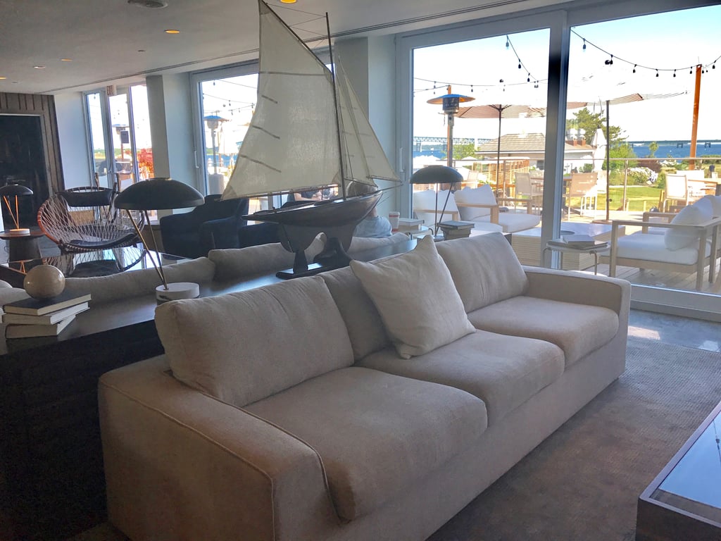 If you're not a fan of sun or if it's raining, there are cool indoor spaces. The interiors were designed by Peter Max Bowden of Petermax. The vibe is sophisticated and nautical with a color palette inspired by Goat Island itself. While it's clean and muted shade-wise (and begging to be Instagrammed!), there are creative knickknacks and marine-chic details throughout.