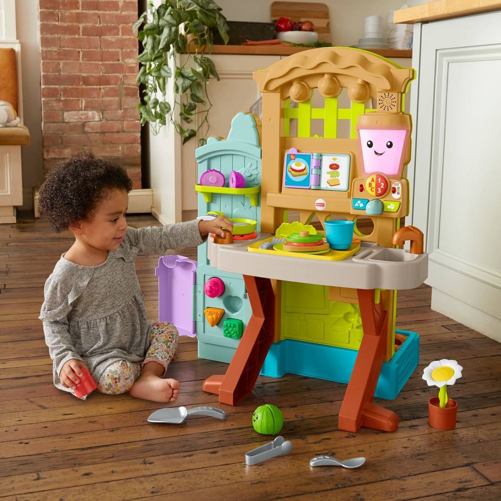 Fisher-Price Laugh & Learn Grow-the-Fun Garden to Kitchen