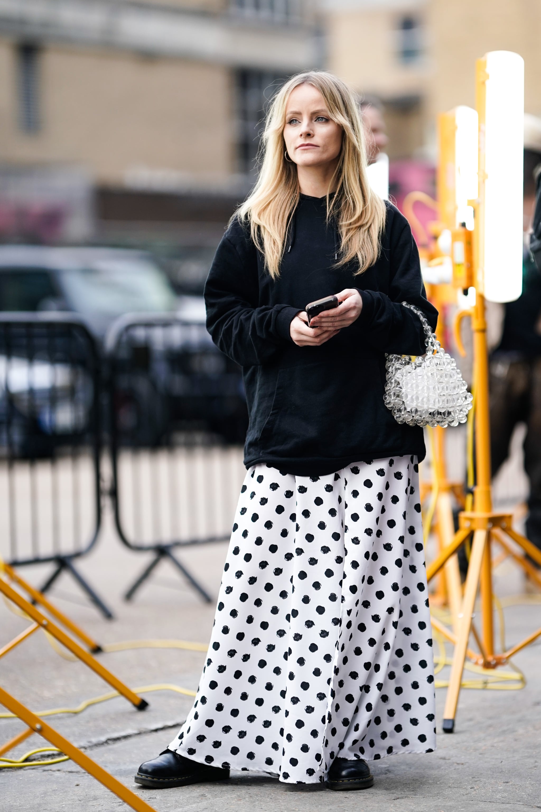 layering sweaters over dresses