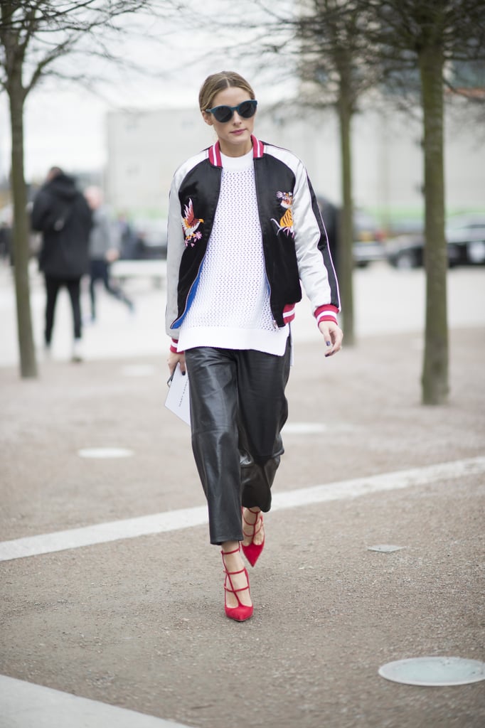 At London Fashion Week, Olivia threw the Topshop bomber over a white sweater and leather culottes for a cool-girl twist.
