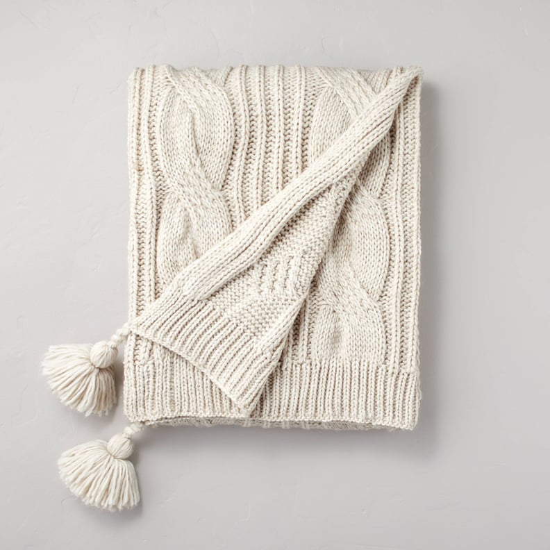 A Chunky Throw: Hearth & Hand With Magnolia Chunky Cable Knit Tassels Throw Blanket