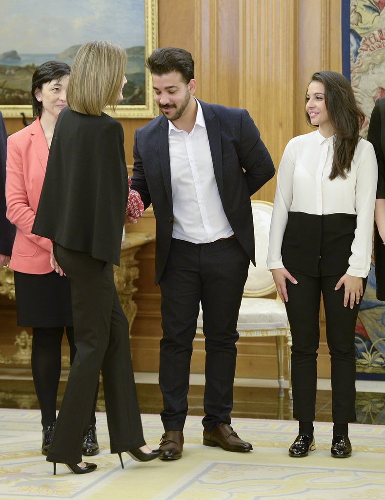 Queen Letizia Wears Chic Cape Look in Madrid