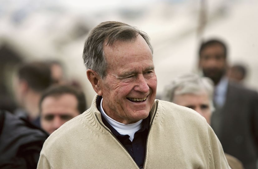 ISLAMABAD, PAKISTAN - JANUARY 17:  Former U.S. President George Bush visits a tent camp for earthquake survivors on the outskirts of Islamabad on January 17, 2006 in Pakistan. Bush, 81, came as a special envoy for the United Nations to speak with survivor