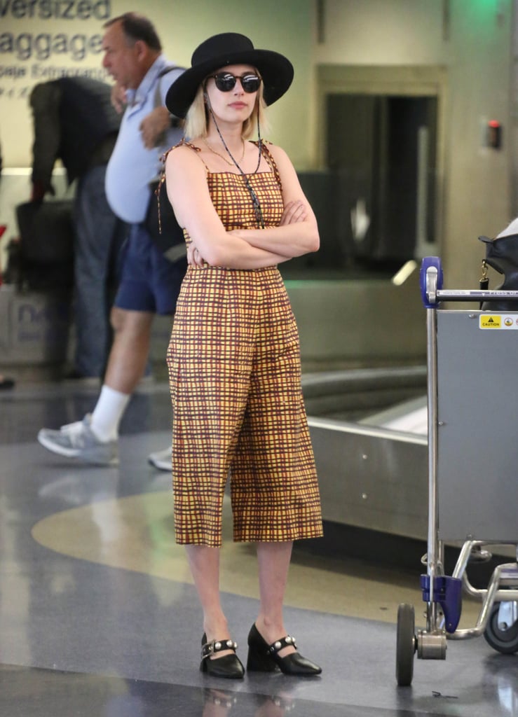 Emma Roberts Black Pearl Pumps in Airport