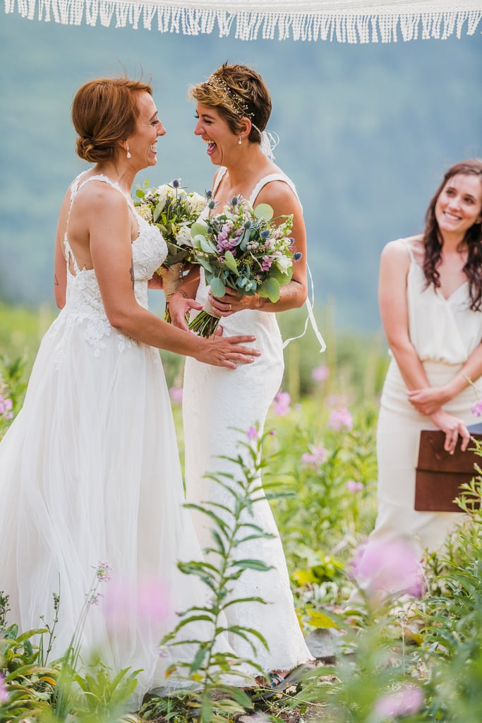 Amy and Meg's breathtaking, semitraditional Jewish ceremony took place in a luscious field on a mountaintop at Glacier National Park in Montana. See the wedding here!