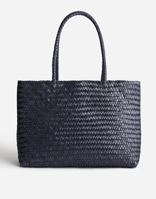 Madewell The Signature Woven Tote ($129, originally $198)
We all need those bags that feel like they can fit anything and everything. This woven navy tote is a great everyday companion to store a laptop, your wallet, and any other essentials when you're on the go.