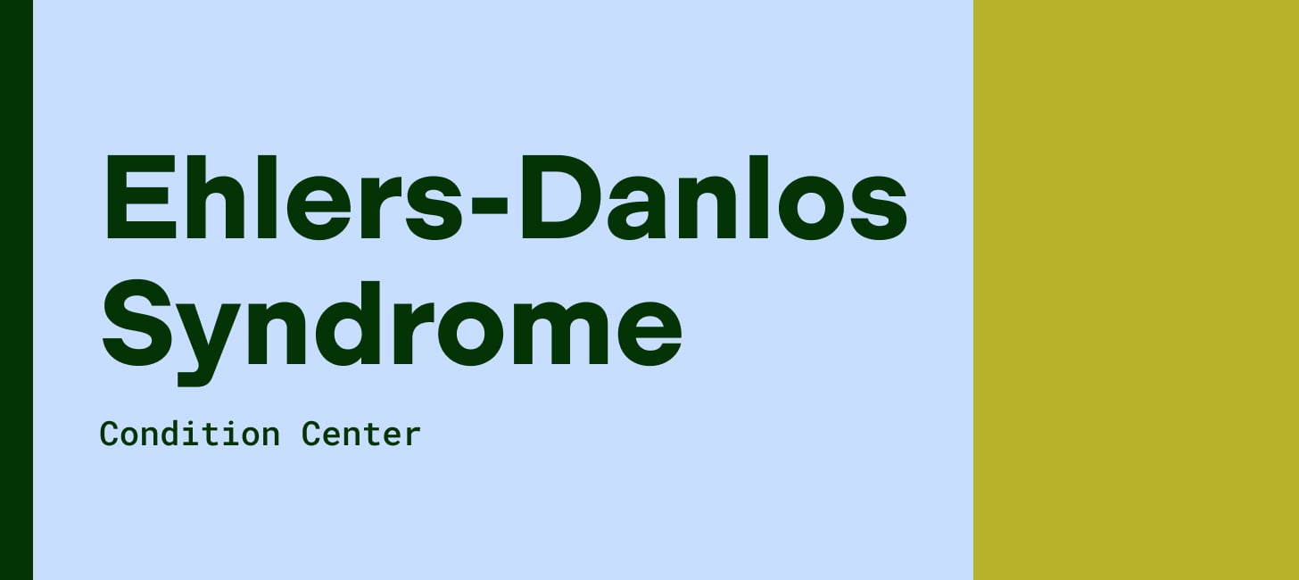 Ehlers-Danlos Syndrome written on a blue and green card.