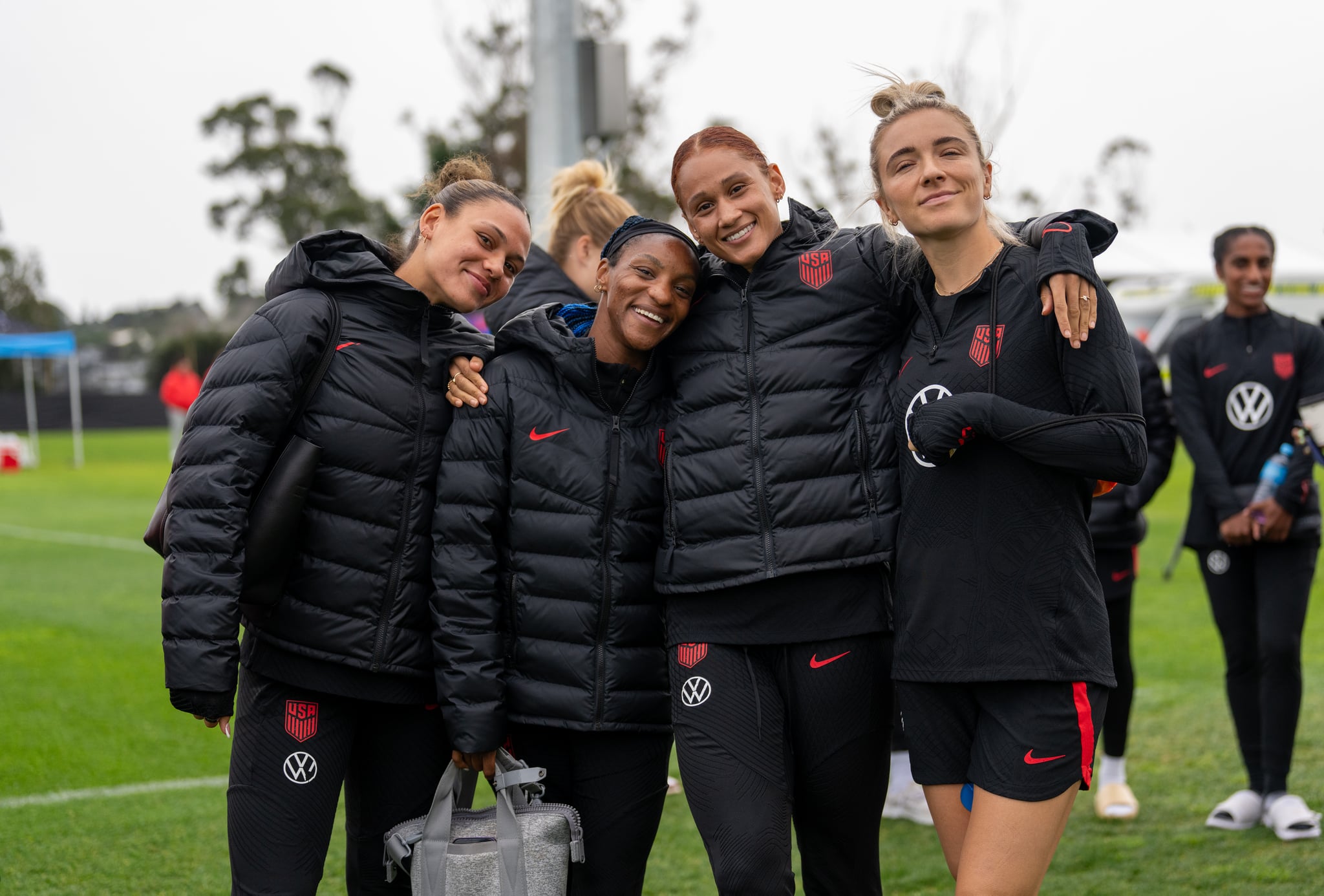 AUCKLAND, NEW ZEALAND - JULY 20: Trinity Rodman #20, Crystal Dunn #19, Lynn Williams #6 and Kristie Mewis #22 of the United States pose for a photo before a USWNT training session at Bay City Park on July 20, 2023 in Auckland, New Zealand. (Photo by Brad Smith/USSF/Getty Images for USSF)