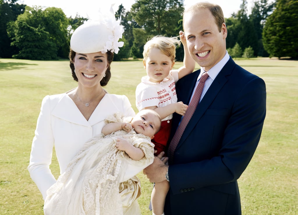 The proud dad was all smiles for their first portrait as a family of four.