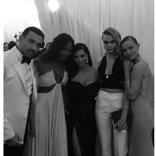 She scored a photo with Givenchy designer Riccardo Tisci, Cara Delevingne, Kate Bosworth, and supermodel Naomi Campbell, who literally LOL'ed at Kim's Vogue cover last month.
Source: Instagram user kimkardashian