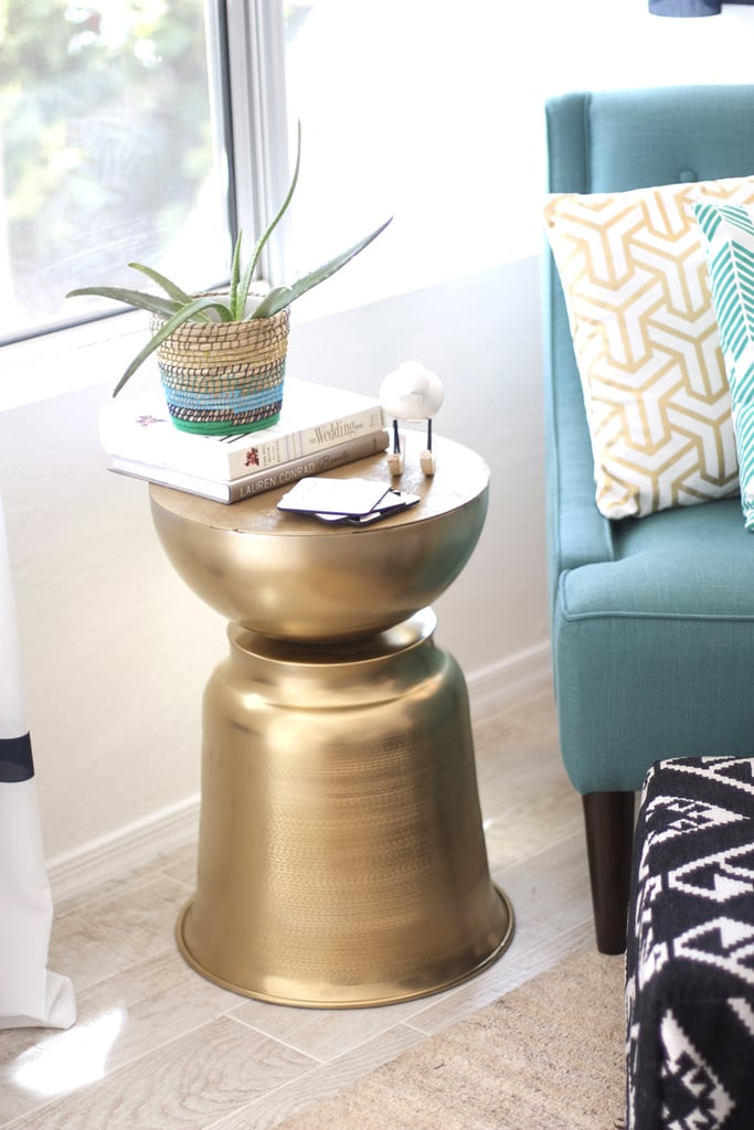 Gold and teal are her signature colors — why not decorate with them?