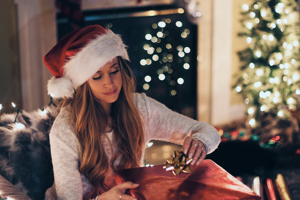 11. Skip Adult Gift Exchanges
Gift-giving for all the little ones in your life is one thing — there's something magical about watching a toddler rip open a box and jump for literal joy over what's inside. But if your shopping list is becoming too arduous, consider asking adults to opt out or, at the very least, opt in on a Secret Santa-type exchange in which you only need to buy one person something special.
12. Have a Few Extra Gifts in Your Back Closet
There will inevitably come a playdate where your preschooler's friend brings over a gift . . . and you didn't reciprocate. Instead of being wracked with guilt and doing a 10 p.m. Target run (though, let's be honest, we love late-night Target runs), have a few wrapped copies of a beloved children's book at the ready for unsuspecting kiddos — and a few bottles of wine with a bow around the neck for unplanned adult gift-giving.