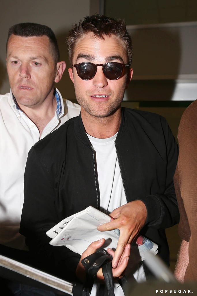 Robert Pattinson Arrives at the Cannes Film Festival 2014