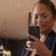 Chrissy Teigen Shows Off Her Baby Bump: "Look at This Third Baby Sh*t"