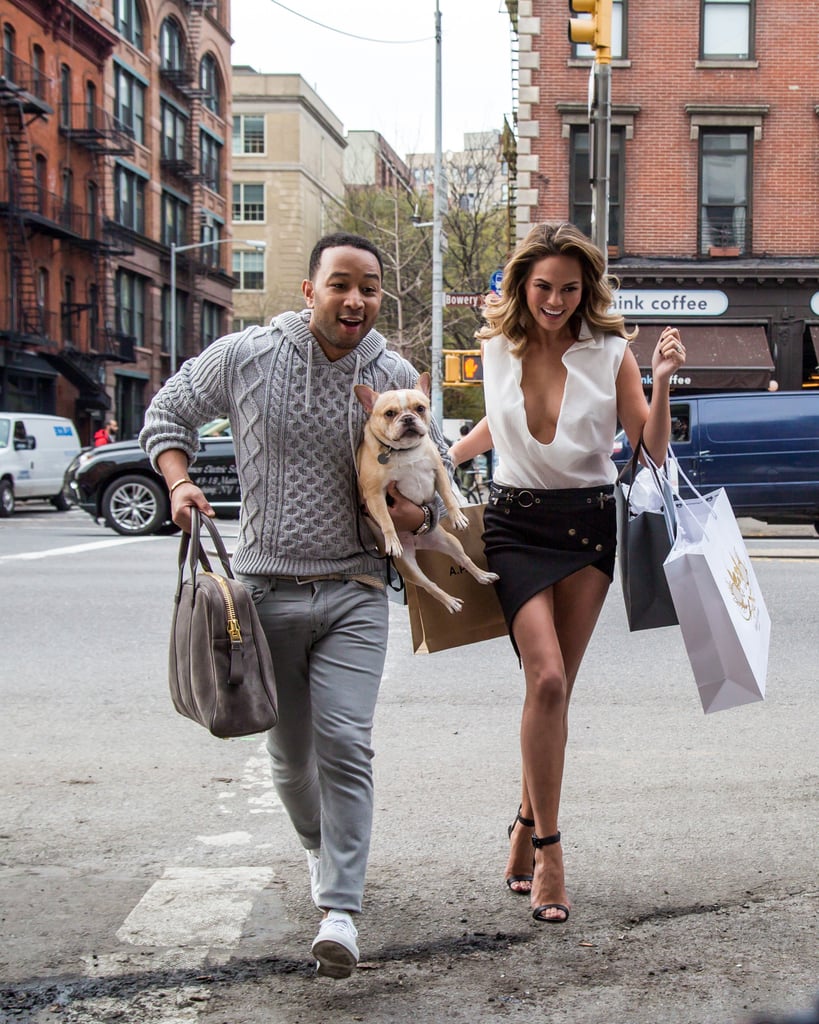 John Legend and Chrissy Teigen strutted their stuff for an adorable NYC photo shoot on Monday.