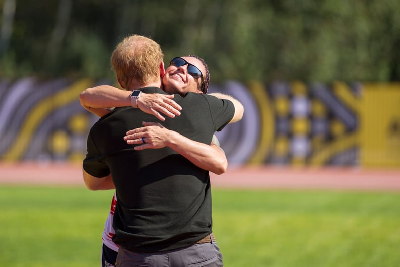 Harry hugged gold medalist Sarah Rudder at the 2017 Invictus Games in Toronto.