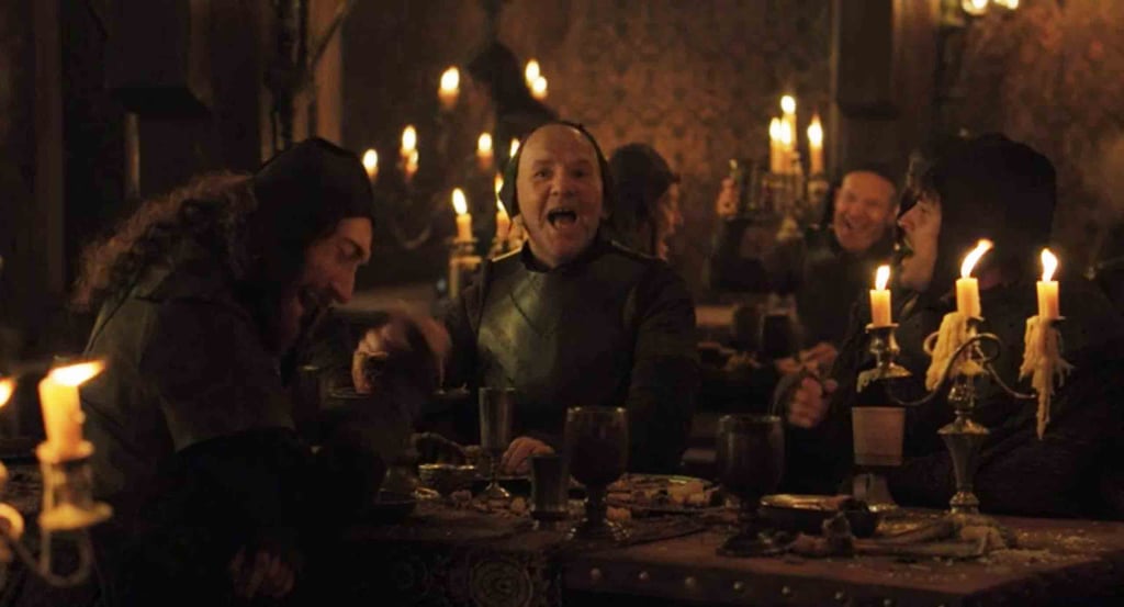 Guests pounding on the table to get everyone's attention at the Red Wedding Revenge