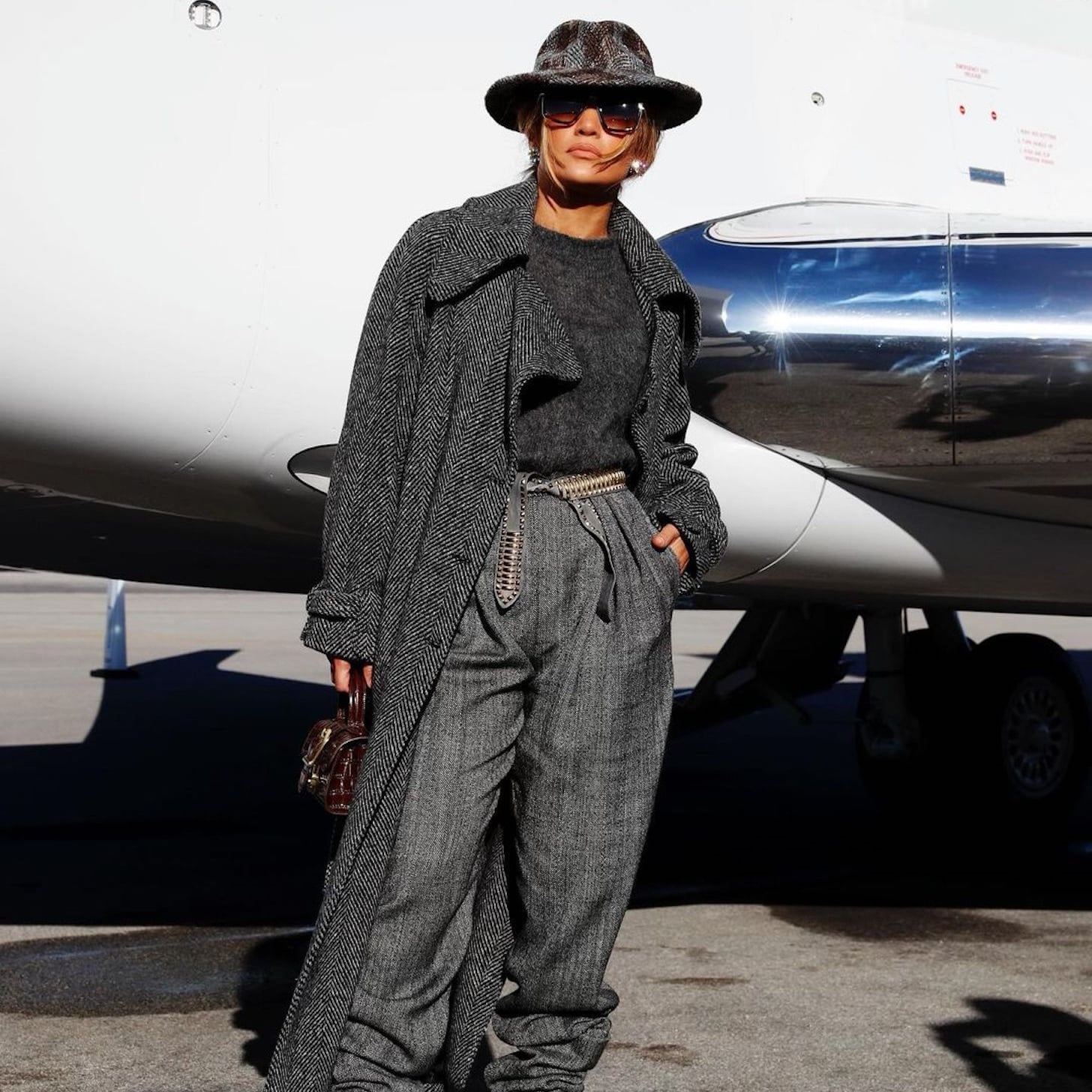 See Jennifer Lopez S Airplane Outfit To Dc For Inauguration Popsugar Fashion