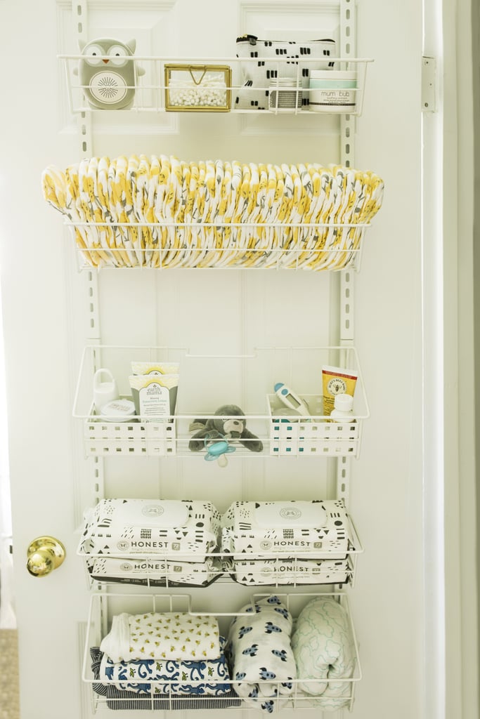 This Easy Move Adjustable Basket Organizer ($50) has high review ratings for good reason. It can be wall-mounted or hung over a door, and can store everything from cleaning supplies to pantry items, and in this case, nursery essentials. I loaded it with diapers, wipes, diaper rash cream, medicine cabinet items, pacifiers, and receiving blankets, and the closet door still closes like a charm.