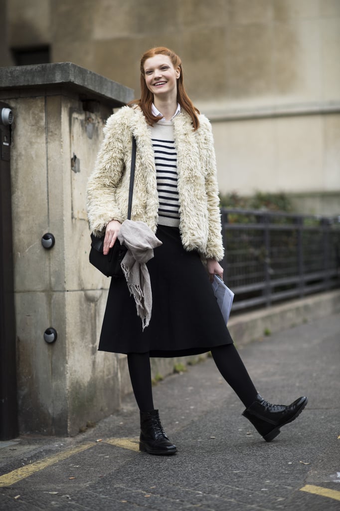 She mastered the chic Parisian vibe in her stripes and furry topper. 
Source: Le 21ème | Adam Katz Sinding