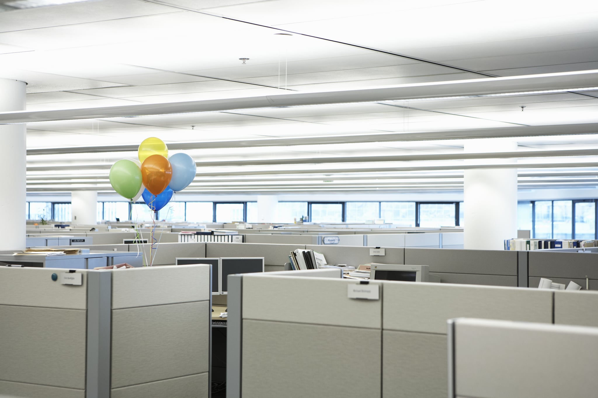 balloons in an office cubicle
