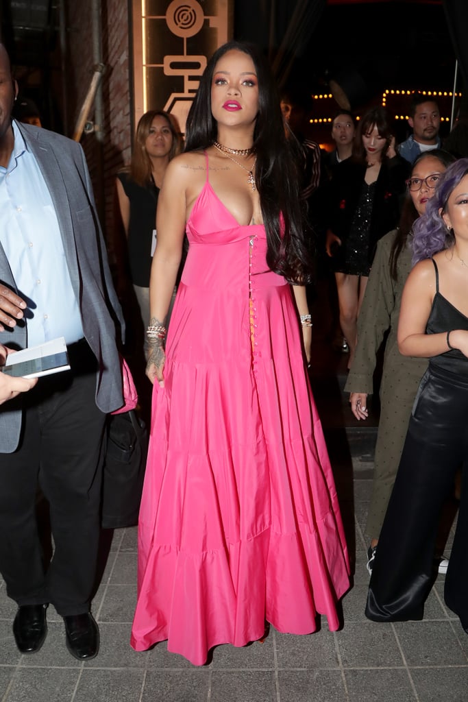 Rihanna Wearing a Pink Dress and Orange Pants in Seoul