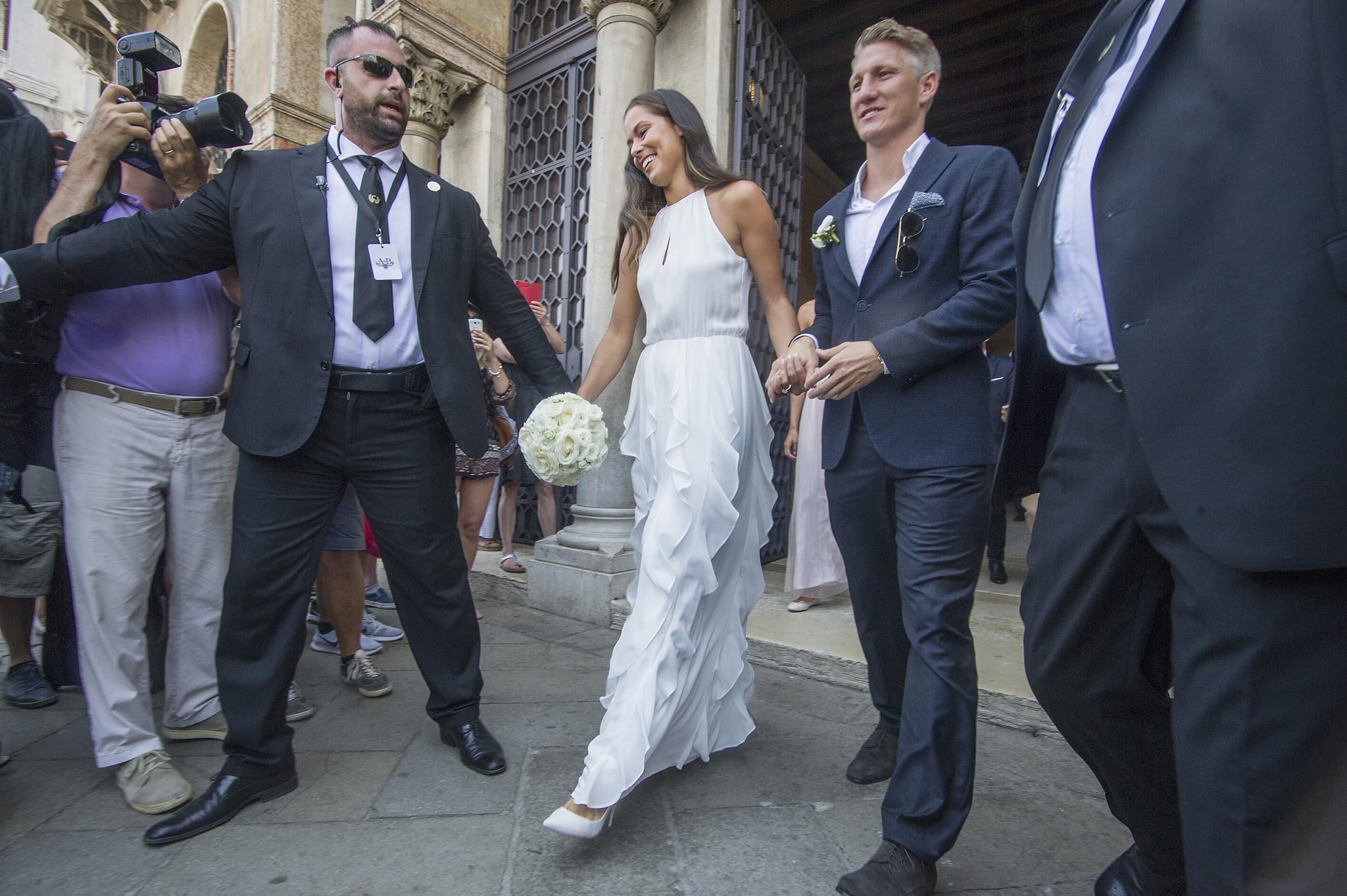 First Anna Wore A Simple Ruffled Halter Style And White Heels At