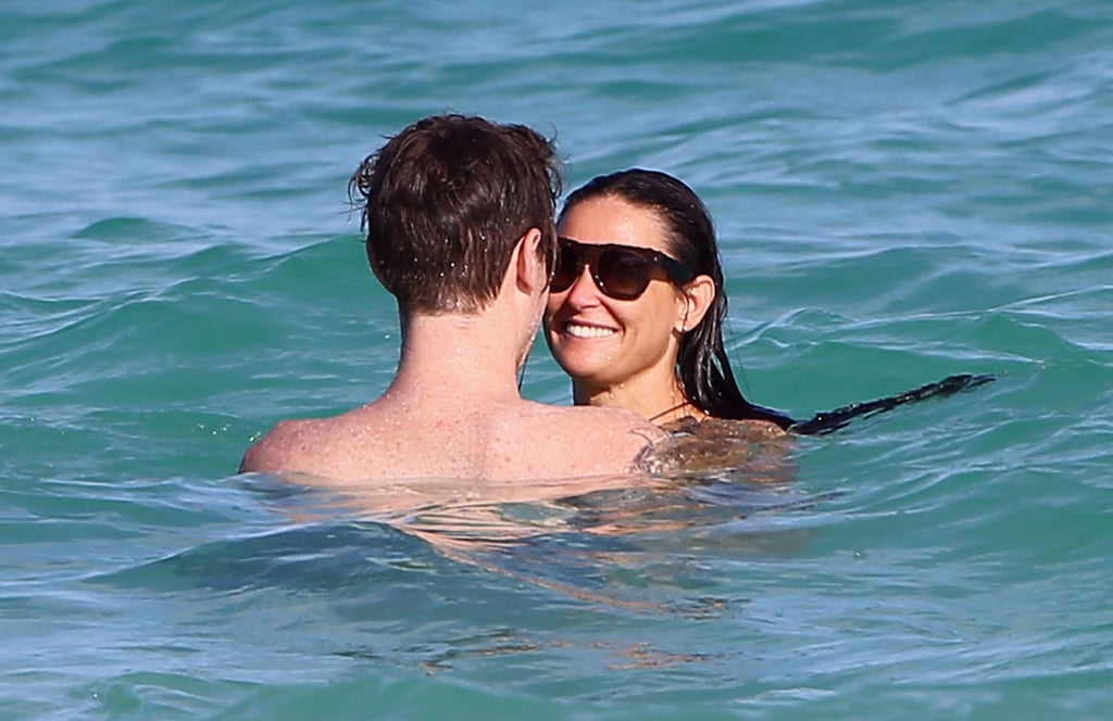 Demi Moore kicked off 2014 with a new guy, 27-year-old drummer Sean Friday, in Mexico.