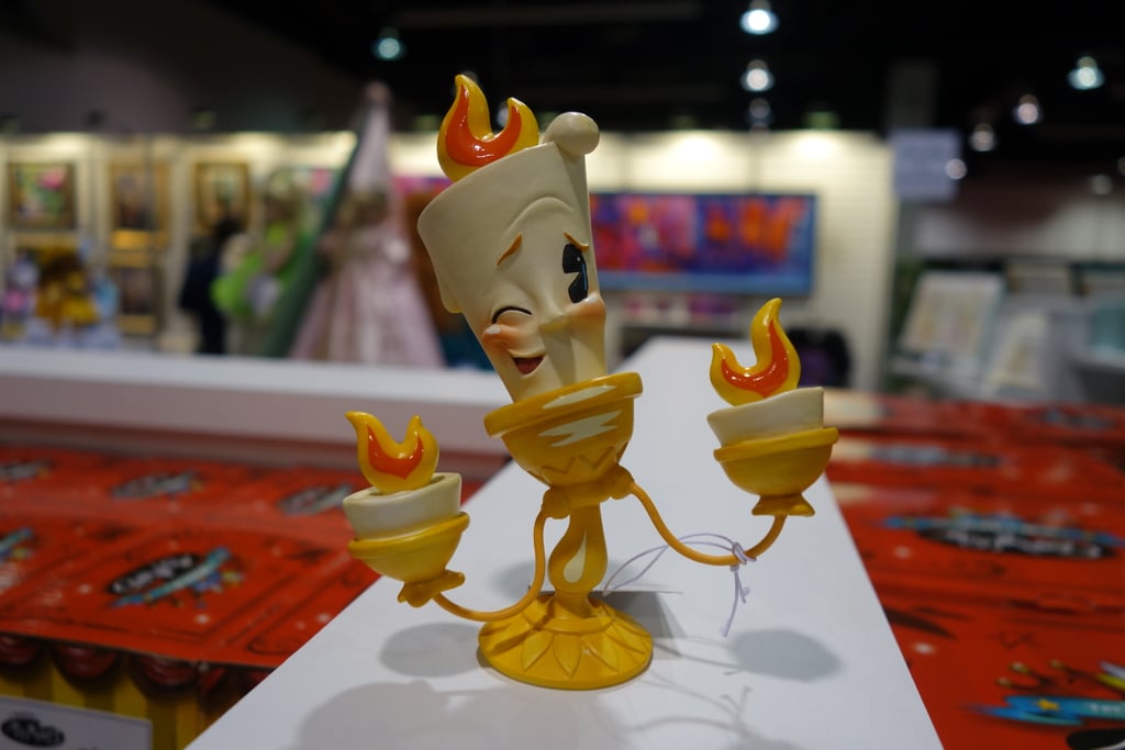 If you want — OK, need — the entire set, there's an adorable Lumière statuette as well.