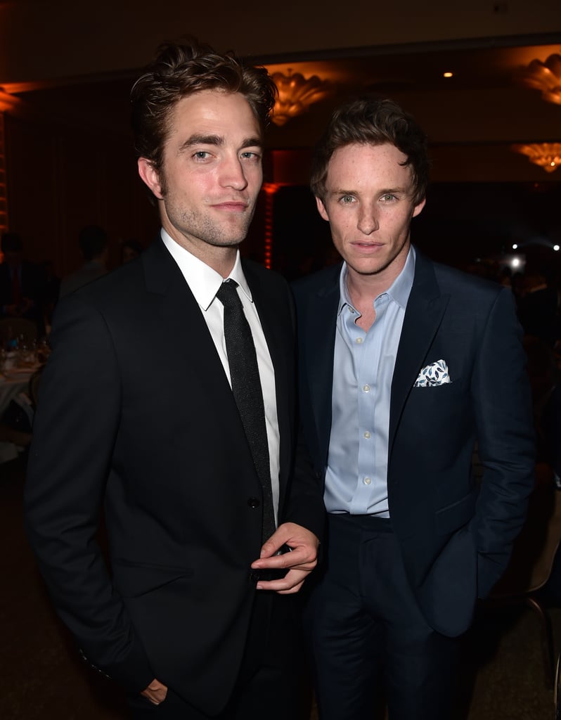 Robert Pattinson and Eddie Redmayne posed together at the HFPA Banquet in August 2014.