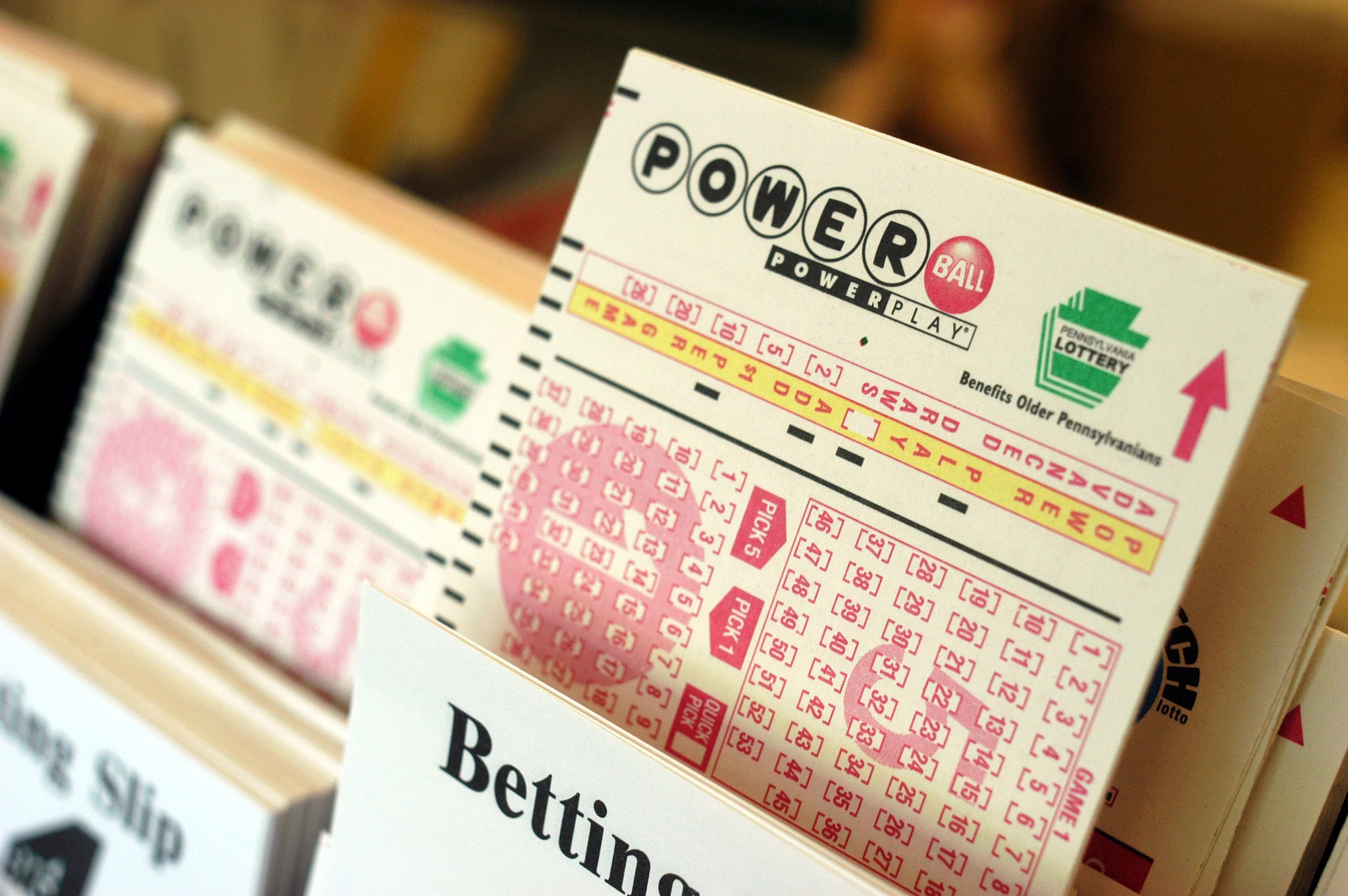 WASHINGTON CROSSING, PA - MAY 10:  Powerball tickets await players at Cumberland Farms convenience store May 10, 2004 in Washington Crossing, Pennsylvania. The winner of the May 8th $213 million dollar Powerball jackpot has yet to come forward. For selling the winning ticket, the Cumberland Farms store will receive $400,000.  (Photo by William Thomas Cain/Getty Images)